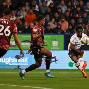 Bolton Wanderers' Amario Cozier-Duberry scores the opening goal