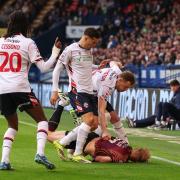 George Johnston goes in on Bradford's George Lapslie