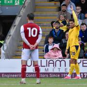 Ruben Rodrigues prepares to take a free kick against Fleetwood Town