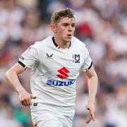 Max Dean - pictured here playing for MK Dons in 2024 - is keen to move back to England from Belgium