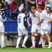 Bolton Wanderers' Sam Dalby is congratulated on scoring his team’s first goal