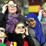 Teachers and youngsters watching the 2015 Solar Eclipse at Gaskell Primary School, Bolton