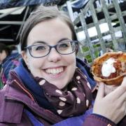 Aileen Rice-Jones and a pie from Peddings and Pie at Bolton's first artisan market at Heaton Fold Garden Centre