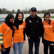 APPEAL: Boxer Amir Khan with Penny Appeal volunteers at flooded Carlisle rugby Club