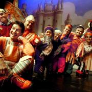 IN A MUDDLE: Stu Francis, front left, as Muddles, with the seven dwarfs and Rachel Martin, back right, as Snow White