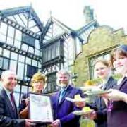 FLASHBACK: Staff at Turton Tower receive the Taste Lancashire Quality Assured award last summer