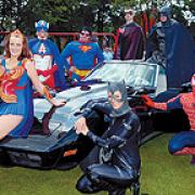 ON PARADE: Local villagers pose as superheroes at the annual fun day. From left, Wonder Woman (Clare Gore), Captain America (Stuart Philbin), Superman (Les Martin), Catwoman (Sharon Pearson), Robin (Lee Smith), Batman (David Cragg) and Spiderman (Michael