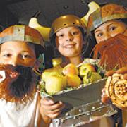 BRINGING HISTORY TO LIFE: Edgworth Primary School pupils, from left, Toby Scowcroft, Aislinn Fryer and Edward Kurnaz in their Viking costumes