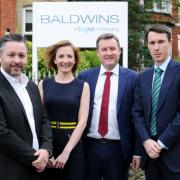Bolton news editor Karl Holbrook with, from left, Lindsey Shepherd, Alex Kelly and Nick Donohue of Baldwins.