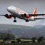 An Easyjet plane takes off from Glasgow Airport..