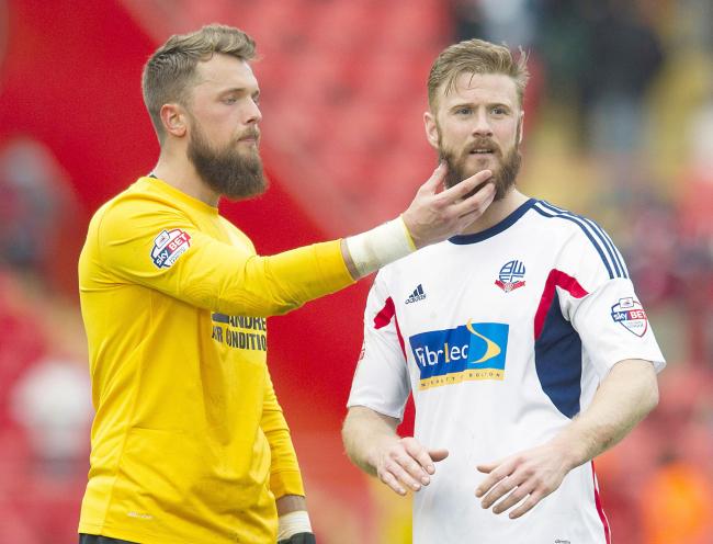Charlton goalkeeper gets a close look at his rival in the big beard stakes, Matt Mills