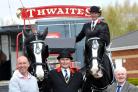 Westhoughton secretary Martin Hodgkiss, left, and Bolton League chairman Mike Hall, right, hold the £1,000 cheque watched by Thwaites horsemen Jonathan Jones, centre, and Richard Green