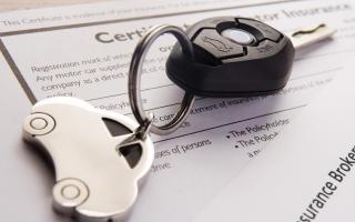 A Generic Photo of car keys on insurance documents. The typical quote for annual comprehensive car insurance has fallen to just under Â£595, AA Insurance said in July, showing a 9.8% year-on-year drop..