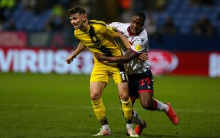Liam Gordon battles for the ball in the 0-0 draw against Burton Albion
