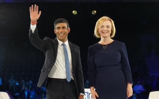 Rishi Sunak and Liz Truss during a hustings event at Wembley Arena (Stefan Rousseau/PA)