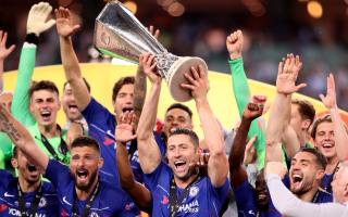 Gary Cahill lifts the Champions League trophy with Chelsea in 2019