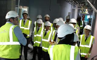 Kings Leadership pupils looking round their new school as it is built