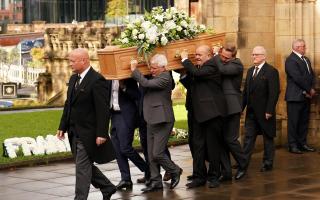The coffin of former Manchester City player and chairman Francis Lee is taken from the church following his funeral service at Manchester Cathedral. Francis Lee died earlier this month following a long battle against cancer. He scored 148 goals in 330