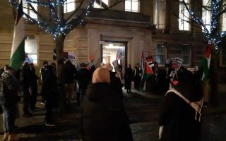 Protesters had gathered outside the town hall ahead of the vote