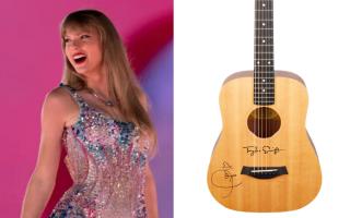 Taylor Swift Baby Taylor acoustic guitar in natural finish signed by the singer