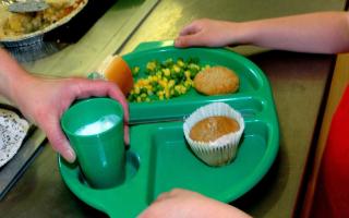 A report says 100,000 school-age children in poverty across the North West cannot claim free school meals, including 5,500 in Bolton