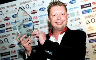 PROUD WINNER: John Roberts, boss of DRL Limited, with the coveted Business of the Year award at the Bolton and Bury Business Awards 2010