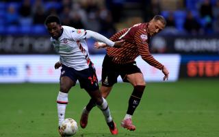 Jordi Osei-Tutu gets the better of Bradford City's Antoni Sarcevic
