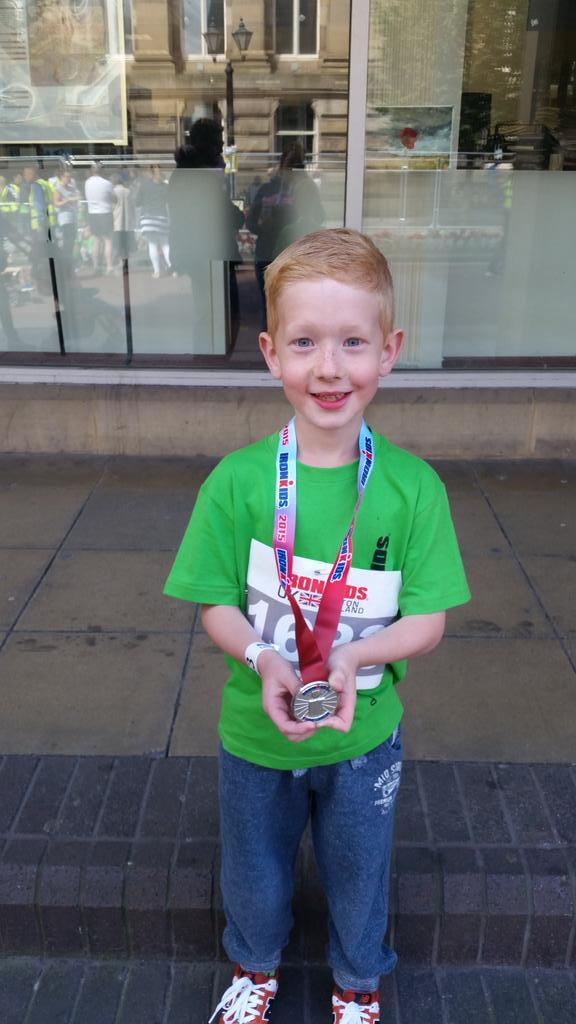 Six-year-old Alfie Dodds after completing his race.